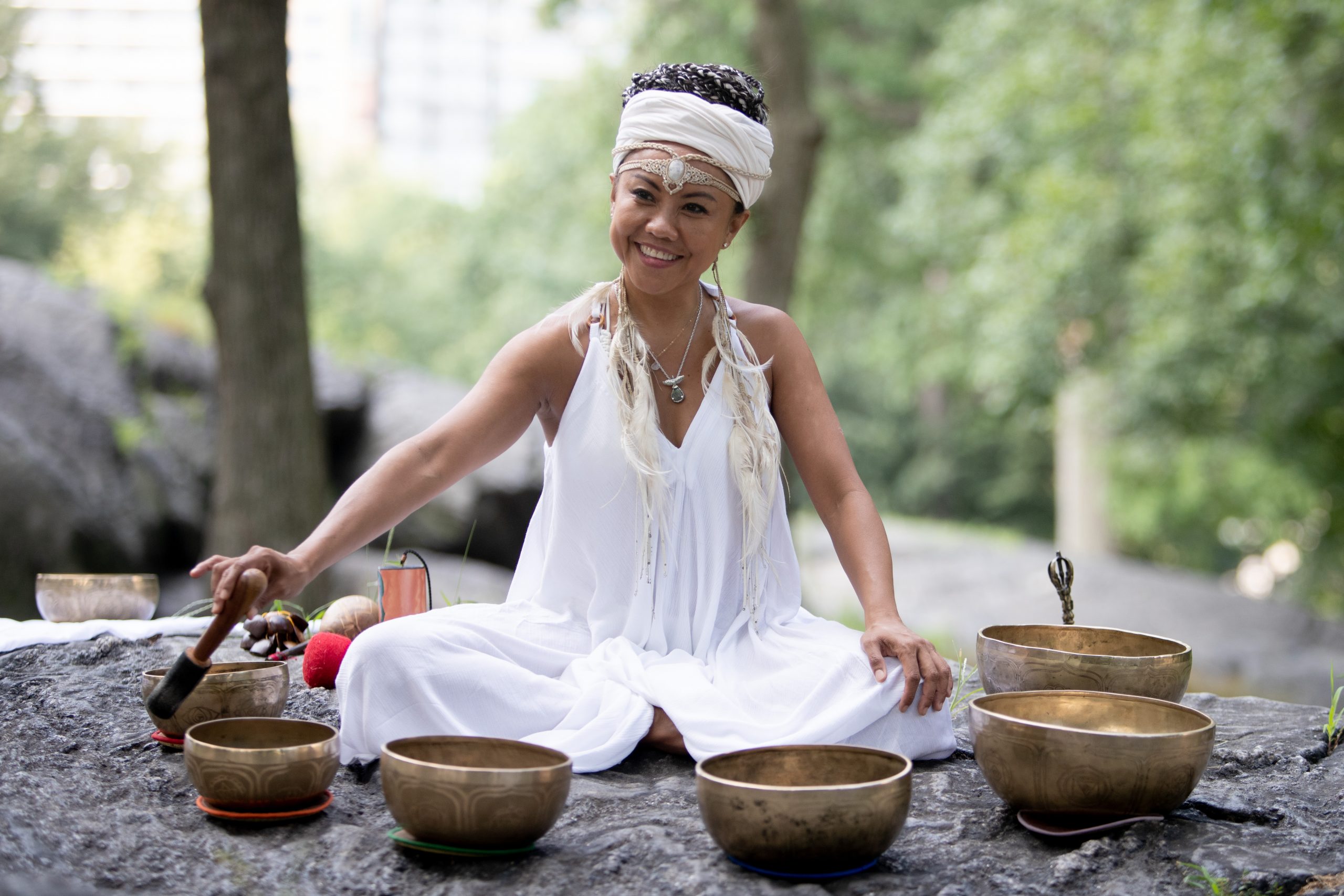 Abigail sound meditation with tibetan bowls on nature
